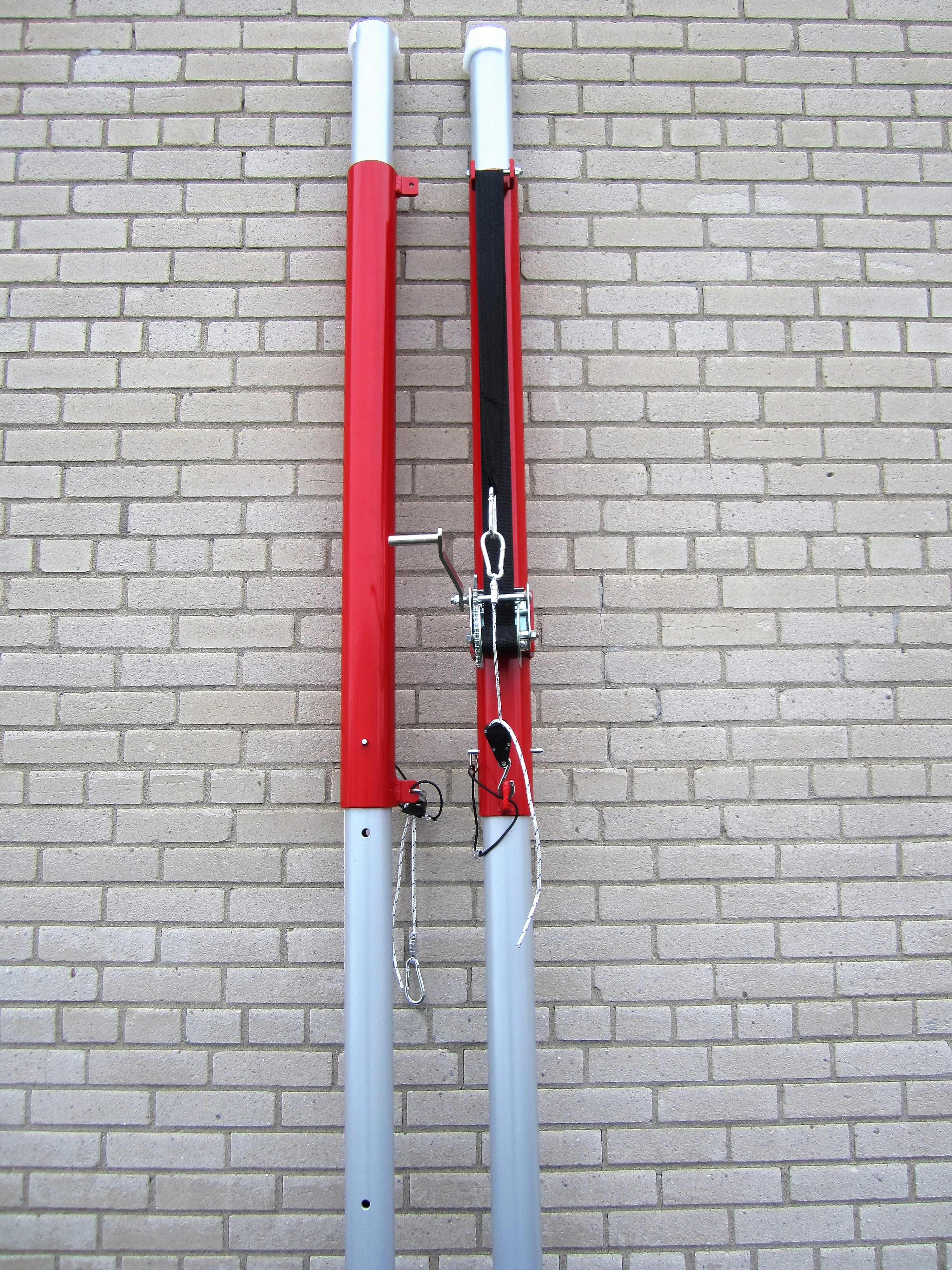 Système de poteaux de volleyball pour gymnase